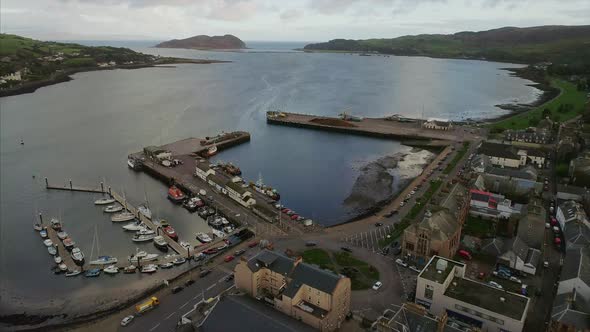 Fly over Campbeltown and loch looking towards Davaar Island