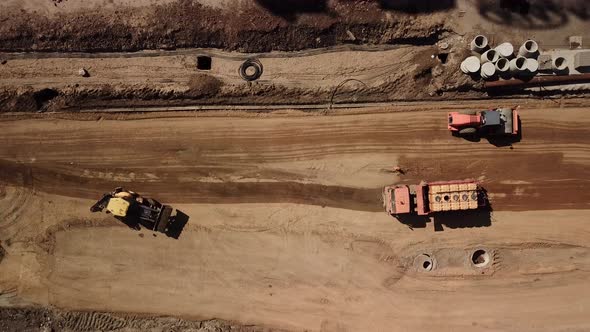 Aerial Construction Site with Machinery, Bulldozer, Excavation