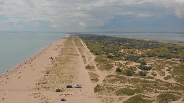 Aerial View of Beach, a Tropical Forest and Ocean with Waves. Azure Beach with Rocky Mountains and