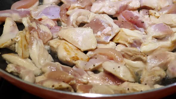 Cooking Chicken Breast on Frying Pan, Closeup