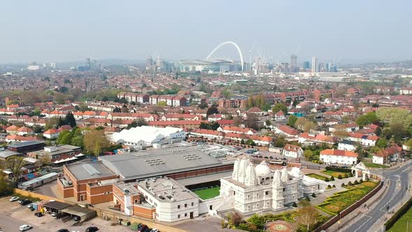 Ariel view of BAPS Shri Swaminarayan Mandir, a Hindu Temple in Neasden, north-west London with Wembl