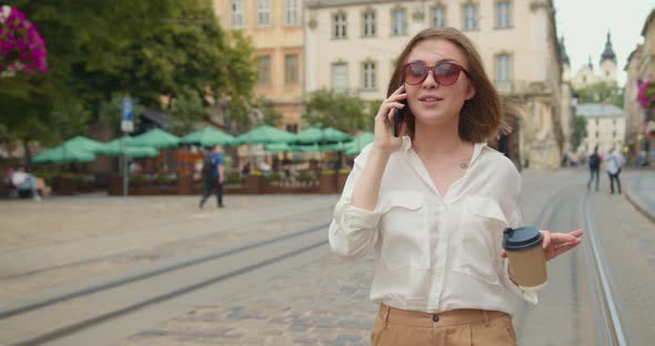 The Girl is Talking on the Phone