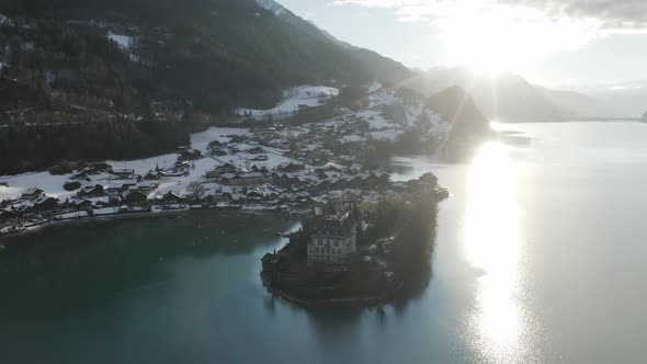 Aerial view of Iseltwald along Brienzersee lake in wintertime, Bern, Switzerland. alt
