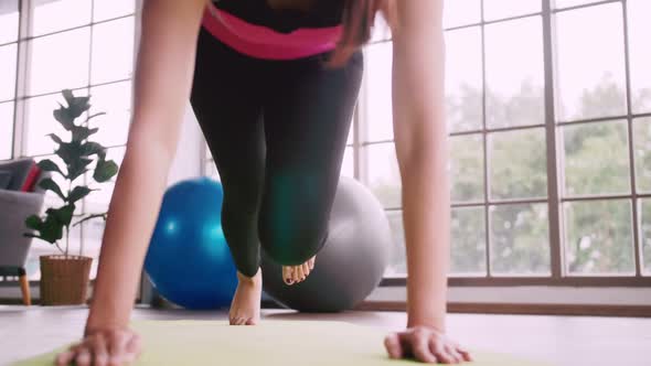 Young Asian woman exercise every morning to stay healthy.