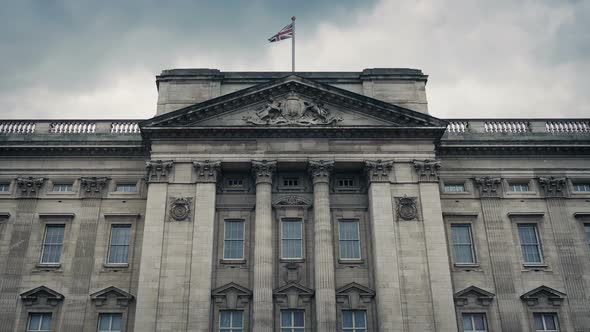 Buckingham Palace Front With Flag Blowing