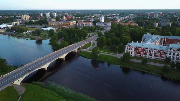 Aerial View of Jelgava City Panorama and Lielupe River in Latvia, Zemgale at Sunset 4K Dron Shot