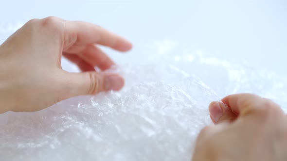 ASMR Woman Presses Plastic Bubble Wrap As a Stress Relief