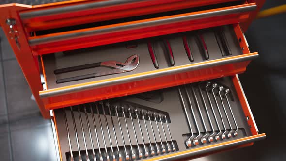 Garage tools organized in metal tool locker. The workshop tools cabinet. Toolbox