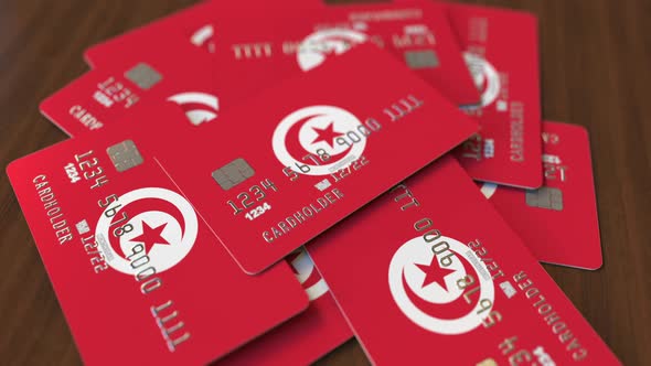 Pile of Credit Cards with Flag of Tunisia