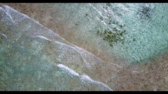 Aerial above abstract of tropical tourist beach time by turquoise ocean and white sand background of