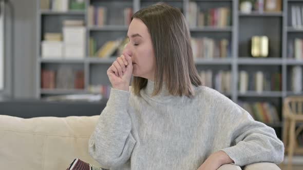 Portrait of Sick Young Woman Coughing