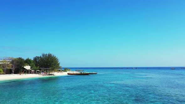 Aerial panorama of beautiful bay beach time by aqua blue ocean and bright sandy background of advent