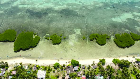 Sandy Beach and Tropical Sea. Pangangan Island, Philippines.