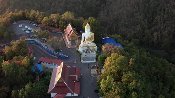 Aerial View of Wat Phrathat Doi Kham Buddha Pagoda and Golden Chedi in Chiang Mai Thailand