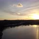 Hovering Over a Large and Big Lake at Sunset - VideoHive Item for Sale