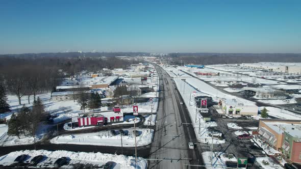 An aerial view of street and houses which are covered with snow after major snowfall in New York Cit