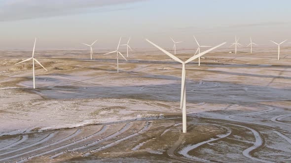 Aerial shots of wind turbines on a cold winter afternoon in Calhan, Colorado