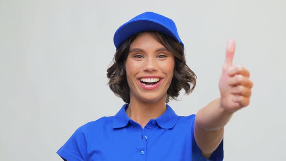 Portrait of Happy Delivery Woman Showing Thumbs Up