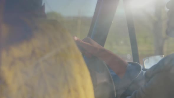 Young couple on a road trip in their pick-up truck