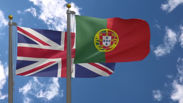 United Kingdom Flag Vs Portugal Flag On Flagpole