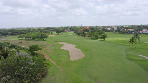 Aerial ascending view of golf course at La Romana in Dominican Republic