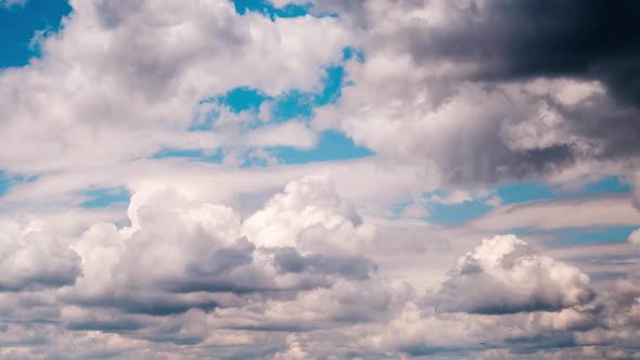 Timelapse of White Cumulus Clouds Moving in the Blue Sky Cloud Space