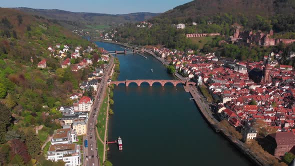 Pedestrian bridge over the river. Beautiful top view of the Heidelberg castle.