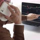 laptop at a stock market and talks on the phone - VideoHive Item for Sale