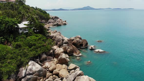Small Houses on Tropical Island. Tiny Cozy Bungalows Located on Shore of Koh Samui Island