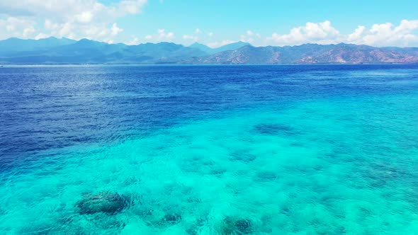 Aerial view panorama of perfect sea view beach journey by blue sea with white sandy background of a 