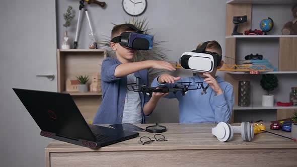 Teen Boys Studing the Construction of Drone Using Virtual Reality Headset