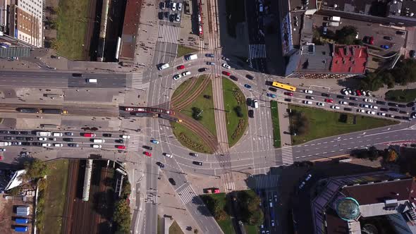 Aerial View of The Bustling Traffic on The Road at the Crossroads in the Big City, Shot in 4K UHD