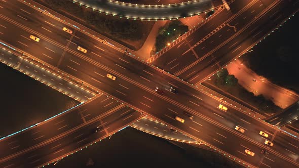 Aerial Top View of Highway Interchange at Night