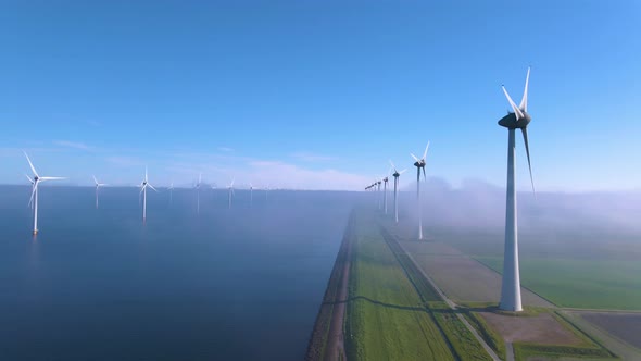 Wind Turbines in the Early Morning Wind Mill Park in the Netherlands