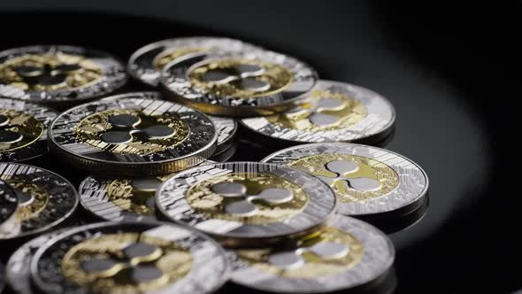 Rotating shot of Bitcoins (digital cryptocurrency) - BITCOIN RIPPLE 