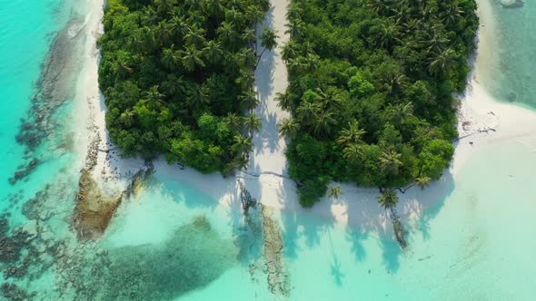 Aerial top view panorama of tropical lagoon beach vacation by turquoise lagoon and clean sand backgr