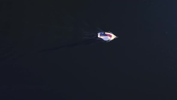  Aerial Shot of a Yacht Sailing in a Lake