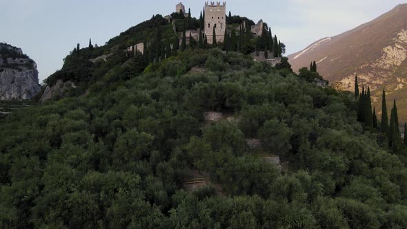 Aerial View Arco Castle in Northern Italy Tourist Destination - Boom Shot