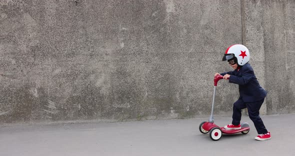 Funny businessman driving retro scooter outdoor