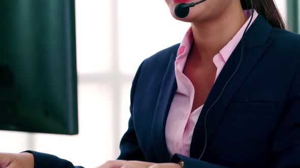 Business People Wearing Headset Working in Office