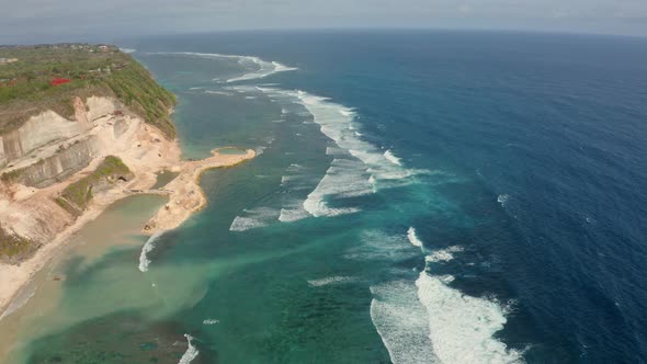 Motion Above Boundless Turqoise Ocean Water with Calm Waves