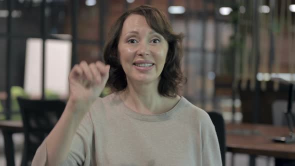 Ambitious Old Woman Waving and Having Conversation