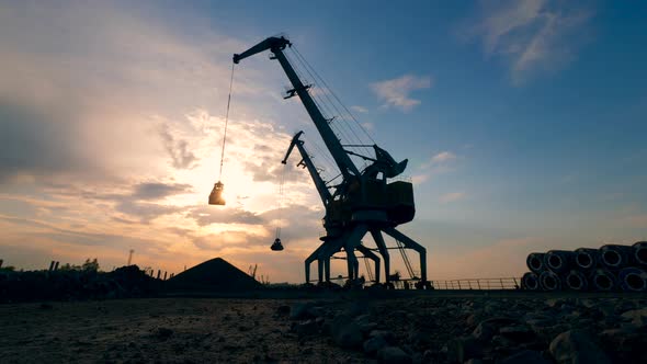 Sundown Site with Two Loaders Transporting Gravel
