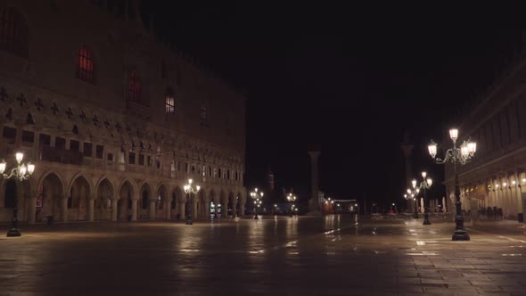 Empty Saint Mark Square with Bright Lanterns at Night
