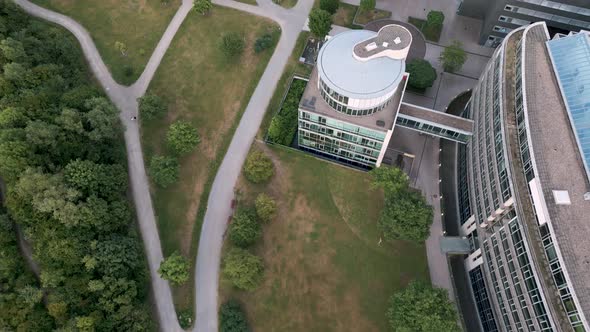 Cologne, Germany - Aerial bird view flight of media park in Köln City Center with green grass, trees