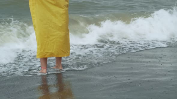 Crop Woman Enjoying Sea Waves