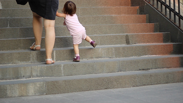 Little Girl Climbing Stairs