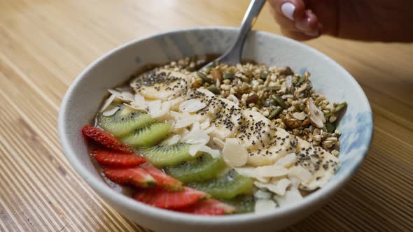 Sweet Vegan Bowl with Banana Kiwi Strawberry and Seeds