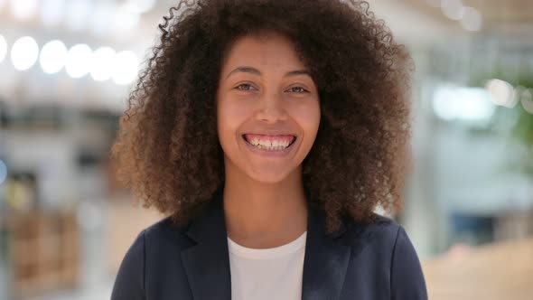 African Businesswoman Head Shake in Approval, Yes Sign 