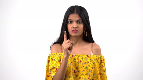 Indian girl threatening someone